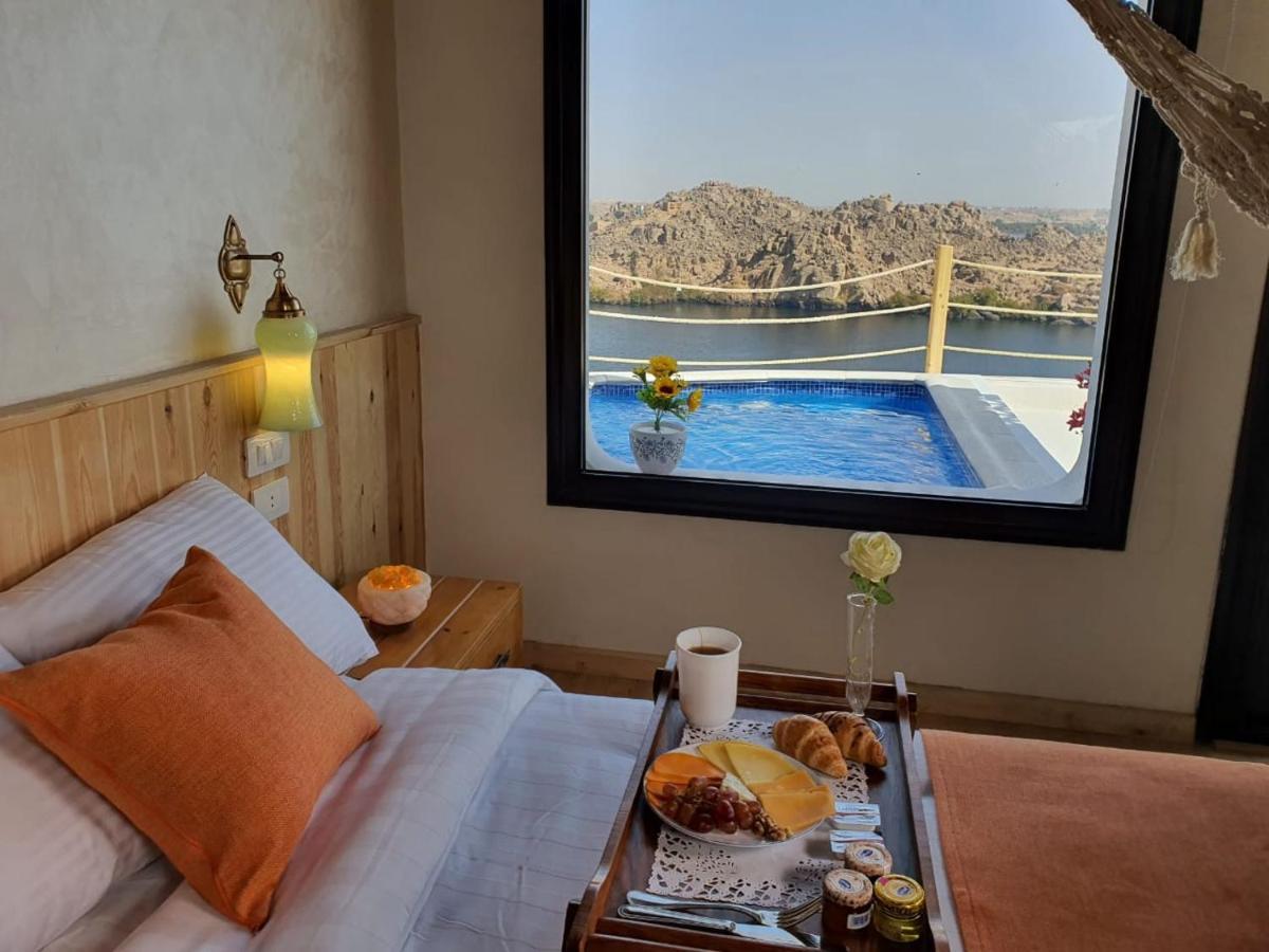 Benben By Dhara Hotels - Adults Only Aswan Buitenkant foto A room at the hotel