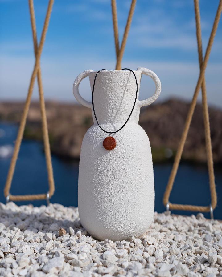 Benben By Dhara Hotels - Adults Only Aswan Buitenkant foto A necklace with a pendant