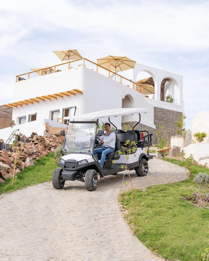 Benben By Dhara Hotels - Adults Only Aswan Buitenkant foto Club Car Villager