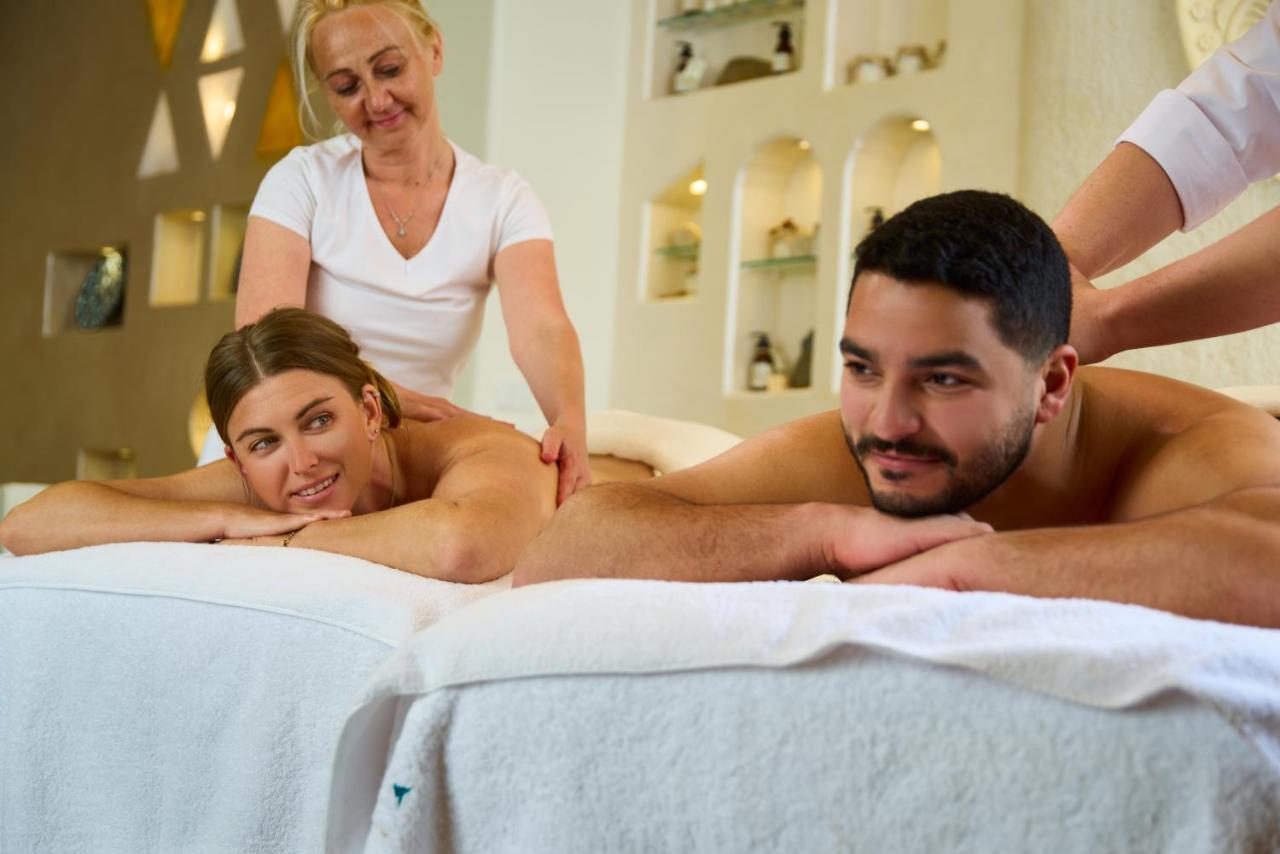 Benben By Dhara Hotels - Adults Only Aswan Buitenkant foto Massage therapists working on a couple