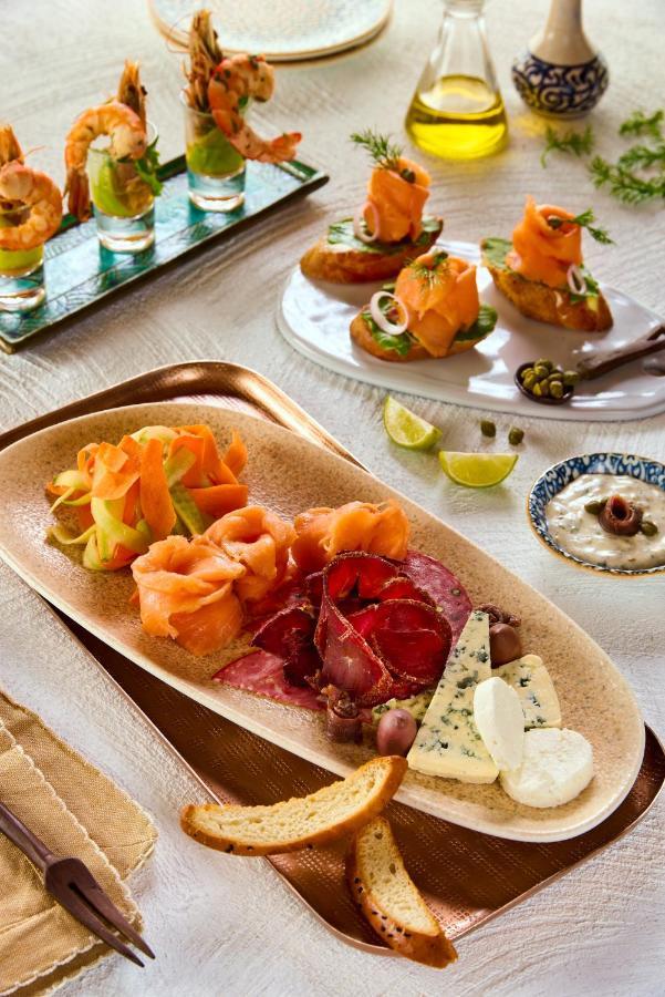 Benben By Dhara Hotels - Adults Only Aswan Buitenkant foto Smoked salmon